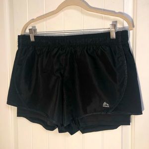 RBX black nylon athletic short with built in spandex shorts underneath